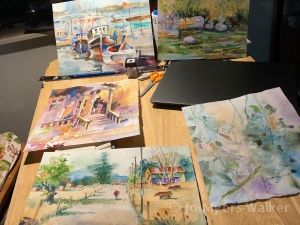 A variety of small watercolors by artist Jo Myers-Walker at the Reiman Gardens 2023 Garden Art Fair